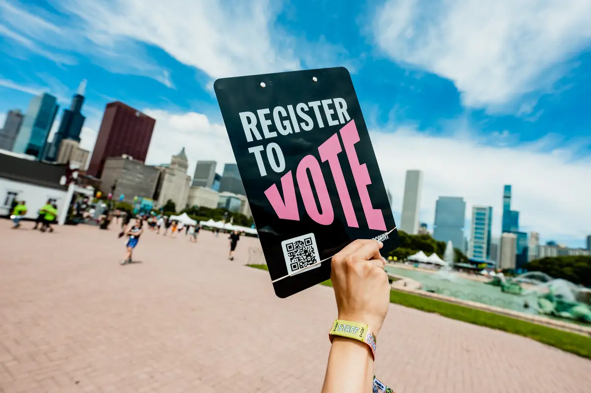 Holding a Register to Vote clipboard