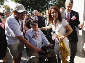 Michele Bachmann greets vets at the World War Two Memorial on the second day of the government shutdown in Washington